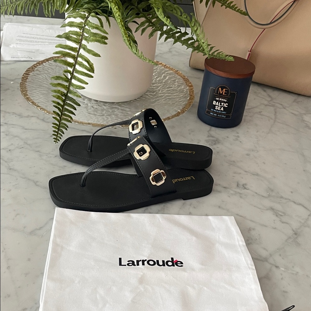 Larroude Black Thong Sandals with Gold Buckle Accents